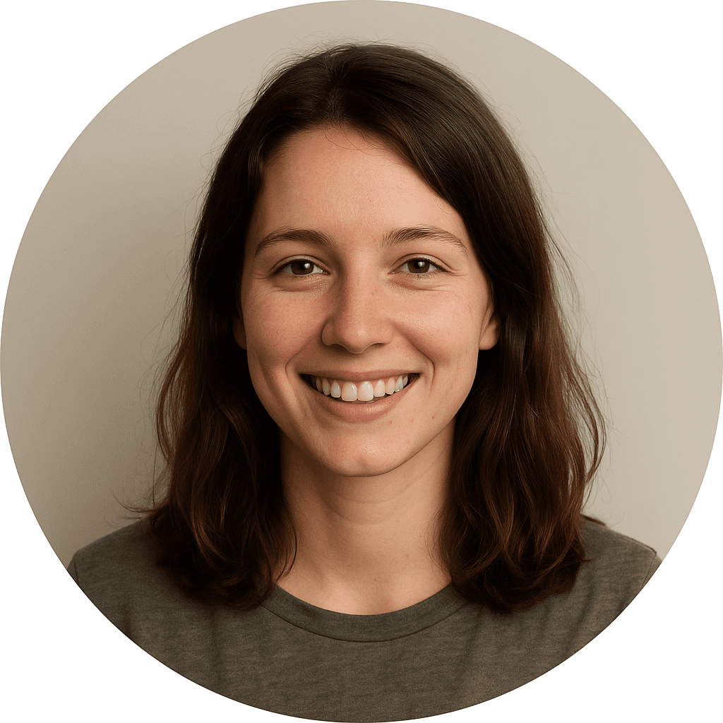 Person with long hair, neutral background.